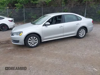 2015 Volkswagen Passat 1.8T Limited Edition with VIN 1VWAT7A32FC003645, listed as a IAAI auction lot 42091376 with 140,675 mi miles. Bid and sale history available at carsss.com. Image 2.