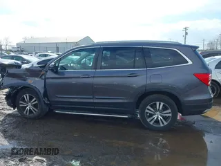 2017 Honda Pilot EX-L with VIN 5FNYF5H53HB029780, listed as a IAAI auction lot 41667838 with 104,803 mi miles. Bid and sale history available at carsss.com. Image 14.