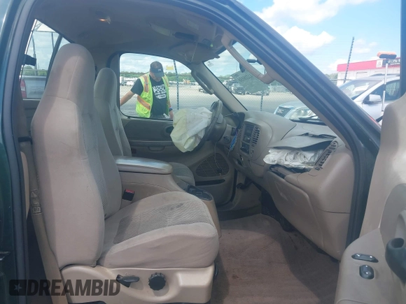 2003 Ford F-150 XL with VIN 1FTRF07W93KC18995, listed as a IAAI auction lot 42216038 with 175,889 mi miles and . Bid and sale history available at DreamBid. Image 5.