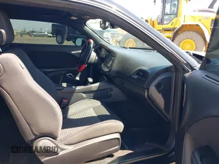 2016 Dodge Challenger SXT Plus z VIN 2C3CDZAG4GH184435, wystawiony jako IAAI lot #42162973 z przebiegiem 168 495 mil mil oraz . Historia ofert i sprzedaży dostępna na DreamBid. Obrazek 5.