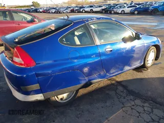 2002 Honda Insight z VIN JHMZE14722T000006, wystawiony jako IAAI lot #41049894 z przebiegiem 185 989 mil mil oraz . Historia ofert i sprzedaży dostępna na DreamBid. Obrazek 4.
