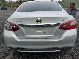 2018 Nissan Altima S with VIN 1N4AL3AP1JC158118, listed as a Copart auction lot 52215455 with 112,491 mi miles and Salvage Title. Bid and sale history available at DreamBid. Image 6.