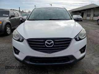 2016 Mazda CX-5 Touring with VIN JM3KE4CY7G0821701, listed as a Copart auction lot 43805495 with 144,416 mi miles and Salvage Title. Bid and sale history available at carsss.com. Image 5.