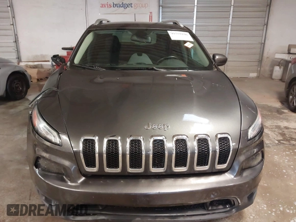 2016 Jeep Cherokee Altitude z VIN 1C4PJLCB0GW338970, wystawiony jako IAAI lot #41559196 z przebiegiem 129 366 mil mil oraz . Historia ofert i sprzedaży dostępna na DreamBid. Obrazek 12.