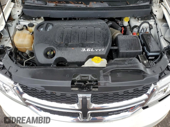 2013 Dodge Journey Crew with VIN 3C4PDCDG9DT537552, listed as a Copart auction lot 58126615 with 96,884 mi miles and Salvage title. Bid and sale history available at DreamBid. Image 12.