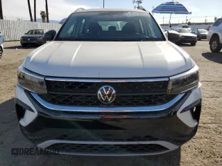 2023 Volkswagen Taos S с VIN 3VVCX7B25PM370076, выставлен на аукционе Copart как лот 47201035 с пробегом 12 000 миль миль и Списание • Salvage title. История ставок и продаж доступна на DreamBid. Изображение 5.