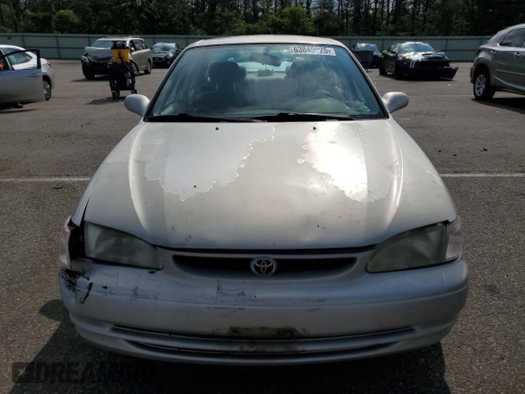1999 Toyota Corolla VE with VIN 2T1BR12E7XC113103, listed as a Copart auction lot 63849025 with 104,830 mi miles and Salvage title. Bid and sale history available at DreamBid. Image 5.