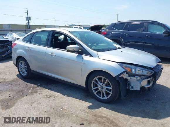2017 Ford Focus SE with VIN 1FADP3F2XHL256136, listed as a IAAI auction lot 42215479 with 89,945 mi miles and . Bid and sale history available at DreamBid. Image 1.