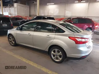 2013 Ford Focus SE z VIN 1FADP3F24DL277767, wystawiony jako IAAI lot #41562390 z przebiegiem 183 322 mil mil oraz . Historia ofert i sprzedaży dostępna na DreamBid. Obrazek 3.