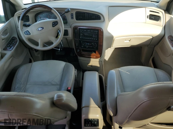 2003 Ford Windstar LTD z VIN 2FMDA584X3BA26817, wystawiony jako Copart lot #74730094 z przebiegiem 87 655 mil mil oraz Czysty tytuł • Clean title. Historia ofert i sprzedaży dostępna na DreamBid. Obrazek 8.
