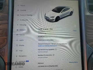 2019 Tesla Model S 100D with VIN 5YJSA1E41KF330631, listed as a Copart auction lot 55360295 with 52,245 mi miles and Salvage title. Bid and sale history available at DreamBid. Image 9.