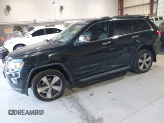 2014 Jeep Grand Cherokee Limited z VIN 1C4RJFBG2EC320282, wystawiony jako IAAI lot #42067273 z przebiegiem 78 061 mil mil oraz . Historia ofert i sprzedaży dostępna na DreamBid. Obrazek 2.