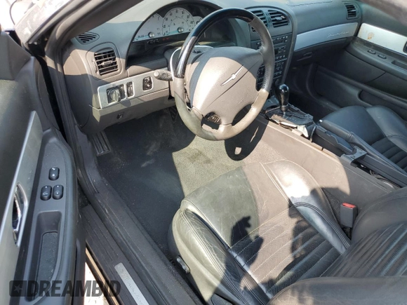 2002 Ford Thunderbird Hardtop Premium z VIN 1FAHP60A22Y107619, wystawiony jako Copart lot #55755765 z przebiegiem 32 306 mil mil oraz Nie do naprawy • Non repairable. Historia ofert i sprzedaży dostępna na DreamBid. Obrazek 8.