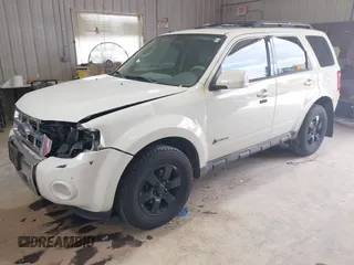 2009 Ford Escape Hybrid z VIN 1FMCU59329KB01081, wystawiony jako IAAI lot #42557114 z przebiegiem 206 972 mil mil oraz . Historia ofert i sprzedaży dostępna na DreamBid. Obrazek 17.