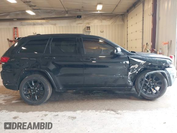 2017 Jeep Grand Cherokee Laredo with VIN 1C4RJFAG3HC841307, listed as a IAAI auction lot 42326035 with 132,655 mi miles and . Bid and sale history available at DreamBid. Image 13.