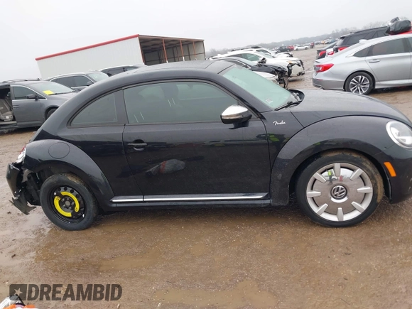 2013 Volkswagen Beetle 2.5L w/Sun/Sound/Nav with VIN 3VWJX7AT1DM686146, listed as a IAAI auction lot 41444277 with 92,964 mi miles and . Bid and sale history available at DreamBid. Image 13.