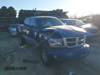 2010 Dodge Dakota Bighorn/Lonestar with VIN 1D7CW3GP5AS130870, listed as a IAAI auction lot 40929651 with 128,077 mi miles. Bid and sale history available at carsss.com. Image 12.