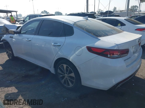 2016 Kia Optima SX Turbo with VIN 5XXGW4L2XGG043934, listed as a IAAI auction lot 40451940 with 86,386 mi miles and . Bid and sale history available at carsss.com. Image 3.