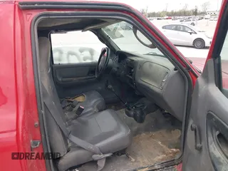 2003 Mazda B-Series Truck SX with VIN 4F4YR12D03TM14307, listed as a IAAI auction lot 41808811 with 153,476 mi miles and . Bid and sale history available at DreamBid. Image 5.