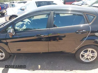 2019 Ford Fiesta SE z VIN 3FADP4EJ0KM125724, wystawiony jako IAAI lot #42320657 z przebiegiem 53 728 mil mil oraz . Historia ofert i sprzedaży dostępna na DreamBid. Obrazek 15.