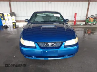 1999 Ford Mustang with VIN 1FAFP4040XF124637, listed as a IAAI auction lot 41793662 with 54,591 mi miles and . Bid and sale history available at DreamBid. Image 12.