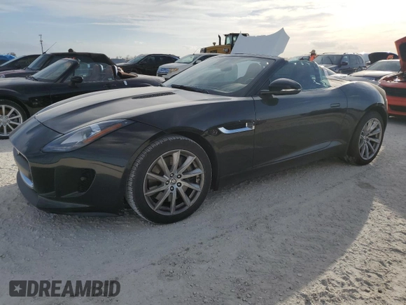 2014 Jaguar F-Type V6 with VIN SAJWA6E74E8K06478, listed as a Copart auction lot 76975894 with Not Provided miles and Salvage Title. Bid and sale history available at DreamBid. Image 1.
