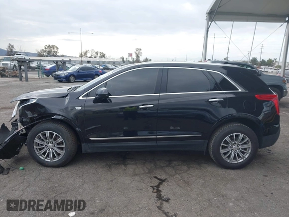 2017 Cadillac XT5 Luxury FWD with VIN 1GYKNBRS8HZ123556, listed as a IAAI auction lot 41549991 with 172,338 mi miles and . Bid and sale history available at DreamBid. Image 14.