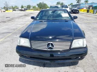 2001 Mercedes-Benz SL-Class with VIN WDBFA68F71F196390, listed as a IAAI auction lot 42128119 with 65,010 mi miles. Bid and sale history available at carsss.com. Image 6.