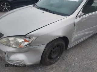 2004 Toyota Camry LE with VIN 4T1BE32K34U824059, listed as a IAAI auction lot 41344406 with 172,003 mi miles and . Bid and sale history available at DreamBid. Image 6.