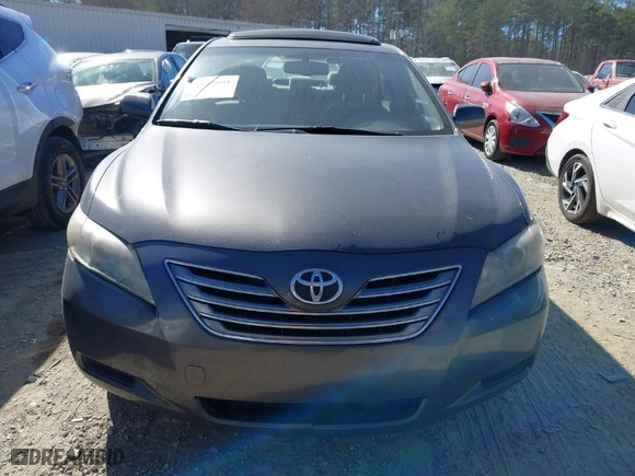 2009 Toyota Camry Hybrid with VIN JTNBB46K893051871, listed as a IAAI auction lot 41672891 with 248,425 mi miles. Bid and sale history available at carsss.com. Image 12.