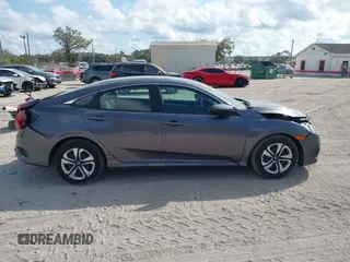 2017 Honda Civic LX with VIN 19XFC2F51HE036153, listed as a IAAI auction lot 41546498 with 78,726 mi miles and . Bid and sale history available at DreamBid. Image 13.