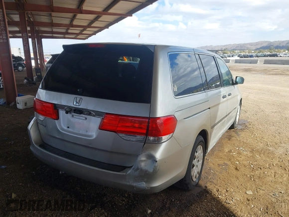 2009 Honda Odyssey LX with VIN 5FNRL38289B049418, listed as a IAAI auction lot 41777253 with 151,512 mi miles and . Bid and sale history available at DreamBid. Image 4.