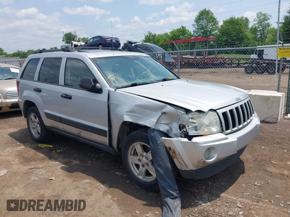 2005 Jeep Grand Cherokee Laredo z VIN 1J4GR48K35C515589, wystawiony jako IAAI lot #42452874 z przebiegiem 253 743 mil mil oraz . Historia ofert i sprzedaży dostępna na DreamBid. Obrazek 1.
