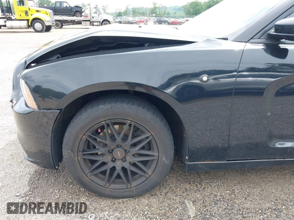 2013 Dodge Charger Police с VIN 2C3CDXAG1DH521921, выставлен на аукционе IAAI как лот 42504902 с пробегом 121 627 миль миль и . История ставок и продаж доступна на DreamBid. Изображение 18.