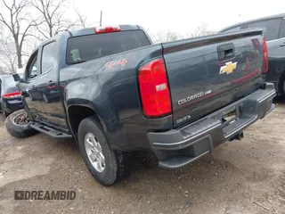 2019 Chevrolet Colorado 4WD Work Truck with VIN 1GCGTBEN8K1306088, listed as a IAAI auction lot 41807366 with 57,376 mi miles. Bid and sale history available at carsss.com. Image 3.