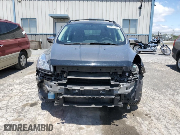 2014 Ford Escape SE с VIN 1FMCU9G90EUC19255, выставлен на аукционе Copart как лот 57267775 с пробегом 102 924 миль миль и Списание • Salvage title. История ставок и продаж доступна на DreamBid. Изображение 5.