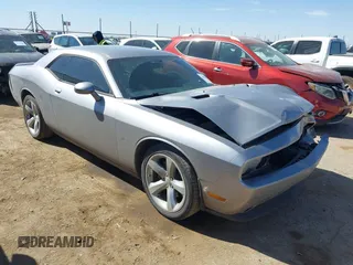 2013 Dodge Challenger SXT z VIN 2C3CDYAG5DH632834, wystawiony jako IAAI lot #41695848 z przebiegiem 132 334 mil mil oraz . Historia ofert i sprzedaży dostępna na DreamBid. Obrazek 1.