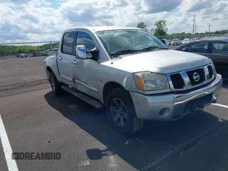 2004 Nissan Titan LE z VIN 1N6AA07B44N514528, wystawiony jako IAAI lot #42188959 z przebiegiem 174 272 mil mil oraz . Historia ofert i sprzedaży dostępna na DreamBid. Obrazek 1.