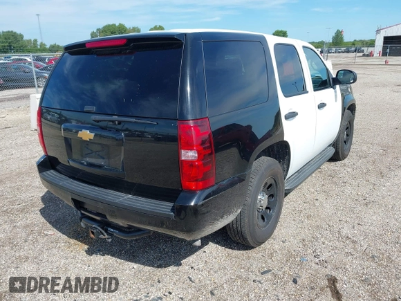 2012 Chevrolet Tahoe Commercial with VIN 1GNLC2E05CR320494, listed as a IAAI auction lot 42838775 with 120,139 mi miles and . Bid and sale history available at DreamBid. Image 4.