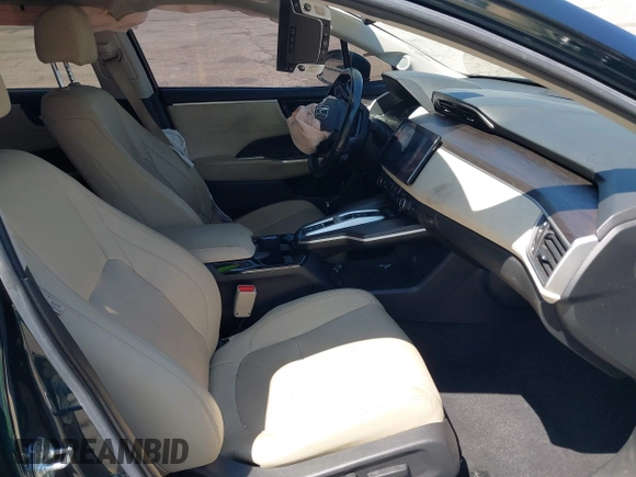 2018 Honda Clarity Plug-In Hybrid Touring with VIN JHMZC5F39JC022655, listed as a IAAI auction lot 42149002 with 118,913 mi miles. Bid and sale history available at carsss.com. Image 5.