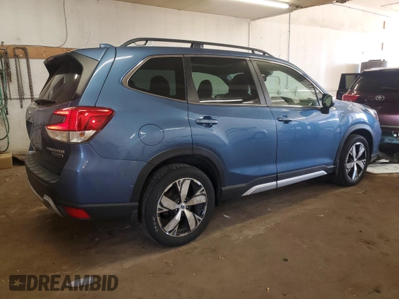 2021 Subaru Forester Touring z VIN JF2SKAXC9MH517699, wystawiony jako Copart lot #58962835 z przebiegiem 60 984 mil mil oraz Szkoda całkowita • Salvage title. Historia ofert i sprzedaży dostępna na DreamBid. Obrazek 3.