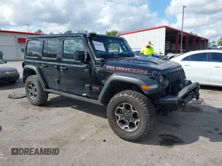 2023 Jeep Wrangler Rubicon with VIN 1C4HJXFGXPW534515, listed as a IAAI auction lot 41524419 with 21,376 mi miles and . Bid and sale history available at DreamBid. Image 1.