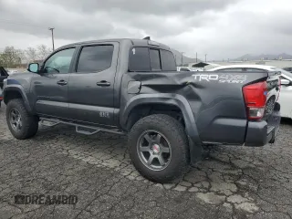2016 Toyota Tacoma SR with VIN 3TMCZ5AN6GM018536, listed as a Copart auction lot 49336645 with 103,298 mi miles and Salvage Title. Bid and sale history available at carsss.com. Image 2.