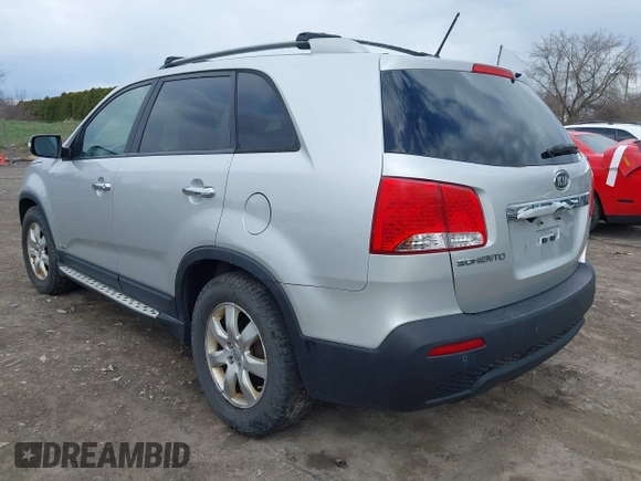 2012 Kia Sorento LX with VIN 5XYKTDA69CG280705, listed as a IAAI auction lot 42055542 with 142,770 mi miles. Bid and sale history available at carsss.com. Image 3.