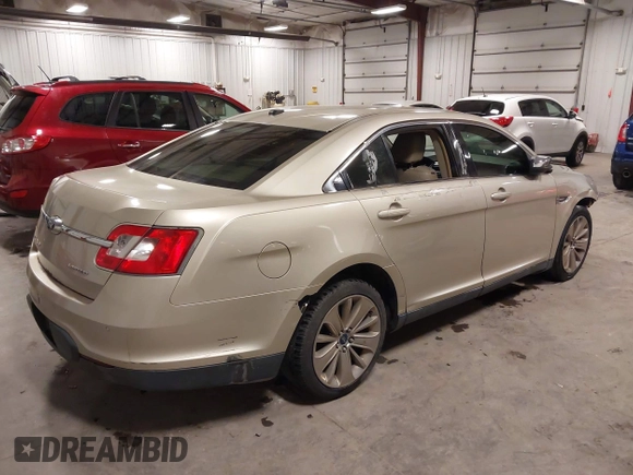 2010 Ford Taurus Limited with VIN 1FAHP2FW9AG133764, listed as a IAAI auction lot 41823527 with 243,477 mi miles and . Bid and sale history available at DreamBid. Image 4.