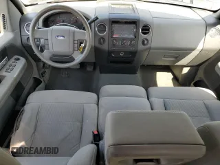 2007 Ford F-150 XLT with VIN 1FTPX14597NA52942, listed as a Copart auction lot 52980215 with 149,889 mi miles and Salvage Title. Bid and sale history available at carsss.com. Image 8.