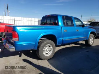 2001 Dodge Dakota Sport with VIN 1B7GG2AN71S112316, listed as a Copart auction lot 50463975 with 216,413 mi miles and Salvage Title. Bid and sale history available at carsss.com. Image 3.