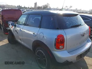 2015 MINI Countryman with VIN WMWZB3C56FWR43359, listed as a IAAI auction lot 40720320 with 69,898 mi miles and . Bid and sale history available at DreamBid. Image 3.