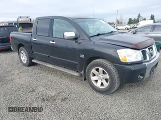 2004 Nissan Titan LE with VIN 1N6AA07A24N549589, listed as a IAAI auction lot 41750807 with 218,118 mi miles. Bid and sale history available at carsss.com. Image 1.