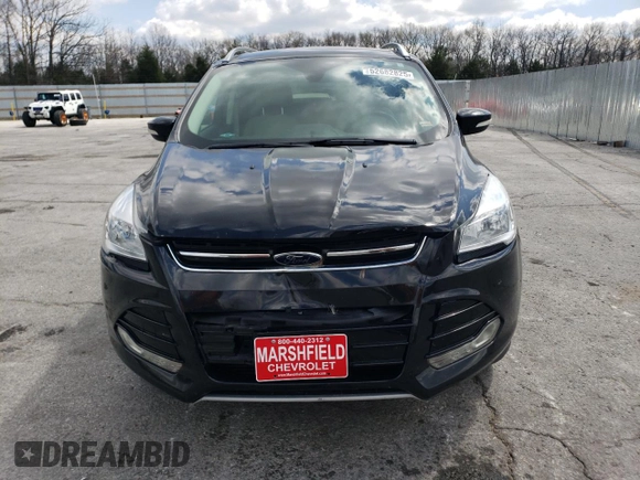 2015 Ford Escape Titanium z VIN 1FMCU0J94FUC07857, wystawiony jako Copart lot #52682825 z przebiegiem 62 100 mil mil oraz Szkoda całkowita • Salvage title. Historia ofert i sprzedaży dostępna na DreamBid. Obrazek 5.